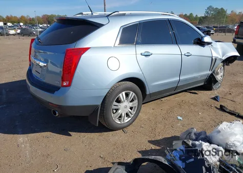 2014 Cadillac Srx Luxury Collection z USA, uszkodzony, nr VIN 3GYFNBE30ES615023